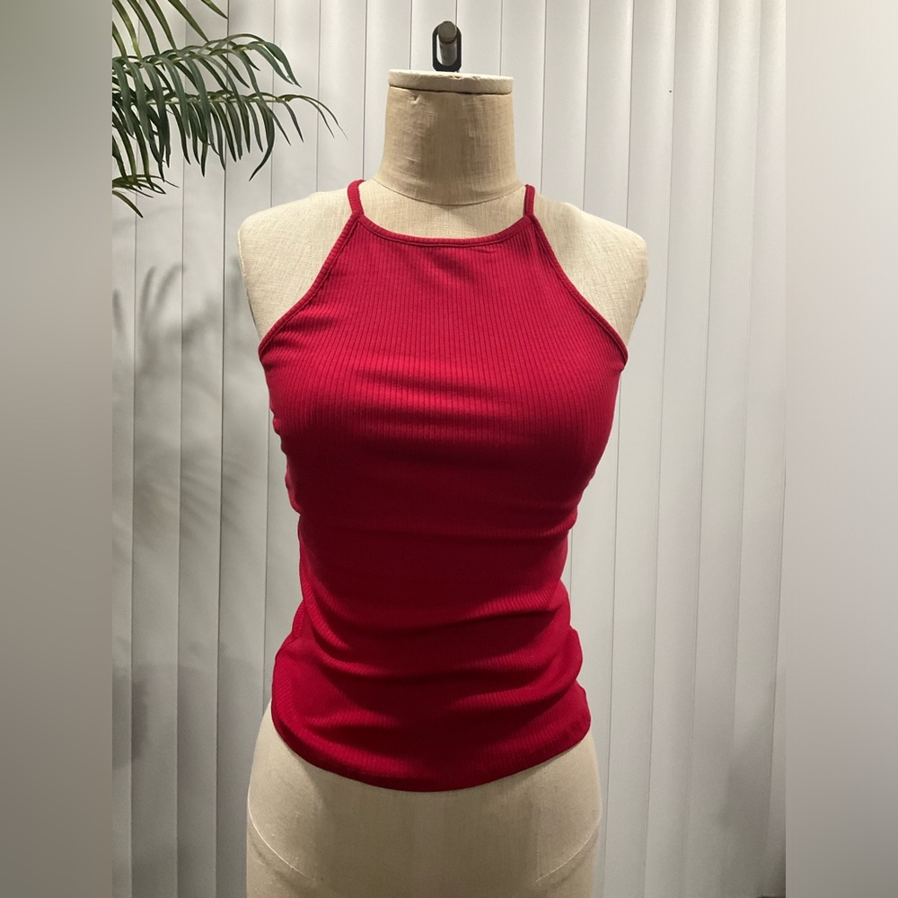 Bundle of three shirts, one size sleeveless